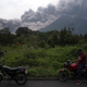 Thick clouds of ash billowing out from the mountain.
